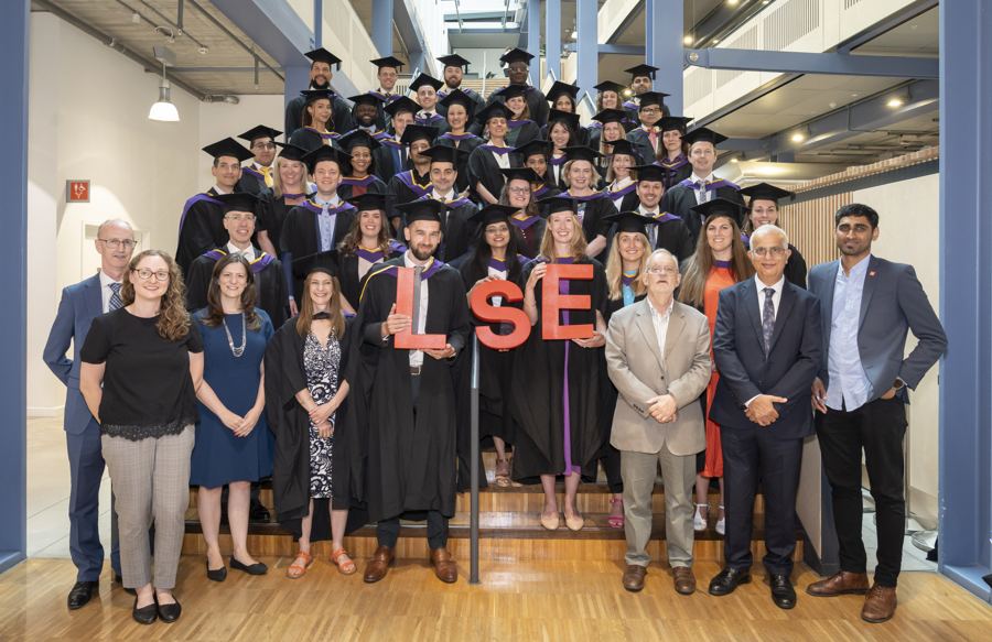 LSE executive cohort in graduation gowns